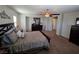 Comfortable main bedroom boasts neutral walls, carpet, and ample space for relaxing at 6656 Fort William St, North Las Vegas, NV 89084