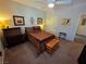 Comfortable main bedroom features a ceiling fan and neutral decor at 6656 Fort William St, North Las Vegas, NV 89084