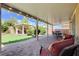 Outdoor patio including a sitting area and dining space at 6656 Fort William St, North Las Vegas, NV 89084