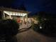 Backyard pergola with outdoor seating and landscaped surroundings at 6656 Fort William St, North Las Vegas, NV 89084