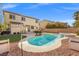 Backyard features a pool, spa, patio, and a well-maintained lawn at 7078 Seabirds Pl, North Las Vegas, NV 89084