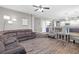 Open-concept living room flows seamlessly into the kitchen and dining areas at 7078 Seabirds Pl, North Las Vegas, NV 89084