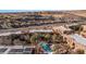Scenic aerial view of a condominium complex with a swimming pool and desert landscape at 730 Hardy Way # A, Mesquite, NV 89027