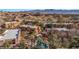 Stunning aerial view of condo complex, pool, mature landscaping, and mountain views at 730 Hardy Way # A, Mesquite, NV 89027