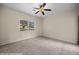 Spacious bedroom features a ceiling fan and a window offering natural light at 730 Hardy Way # A, Mesquite, NV 89027
