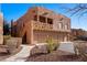 Stunning multi-level home with a three-car garage and unique Southwest-style architectural details at 730 Hardy Way # A, Mesquite, NV 89027