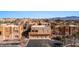 Desert condo featuring a three car garage and desert landscape at 730 Hardy Way # A, Mesquite, NV 89027