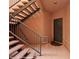 Hallway entrance to condo featuring stairs and unit door at 730 Hardy Way # A, Mesquite, NV 89027