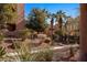 Beautifully landscaped grounds with walking path, mature trees and shrubs at 730 Hardy Way # A, Mesquite, NV 89027