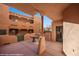 Private patio with architectural pillars offering views of the building at 730 Hardy Way # A, Mesquite, NV 89027