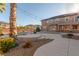 Spacious backyard with a pool, ample patio space, and string lights for evening enjoyment at 7338 Flying Pegasus Ct, Las Vegas, NV 89131