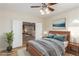 Bedroom showcasing a cozy bed with plush bedding and soft lighting at 7338 Flying Pegasus Ct, Las Vegas, NV 89131