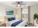 Serene bedroom with plush bedding, stylish decor, and plenty of natural light at 7338 Flying Pegasus Ct, Las Vegas, NV 89131