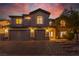 Beautiful two-story home with a three-car garage and meticulously maintained landscaping at 7338 Flying Pegasus Ct, Las Vegas, NV 89131