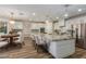 Gourmet kitchen with granite countertops, stainless steel appliances, and a large center island at 7338 Flying Pegasus Ct, Las Vegas, NV 89131