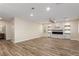 Bright living room with fireplace and custom shelving, offers ample space at 7338 Flying Pegasus Ct, Las Vegas, NV 89131
