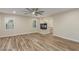 A spacious primary bedroom has tile flooring, a fireplace, and a separate seating area with soaking tub at 7338 Flying Pegasus Ct, Las Vegas, NV 89131