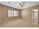 Spacious bedroom with tile flooring and natural light at 7564 Wingspread St, North Las Vegas, NV 89084