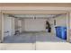 The garage includes built-in cabinets, storage space, and water heater at 7564 Wingspread St, North Las Vegas, NV 89084