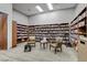 Community library with bookshelves filled with books and seating at 7564 Wingspread St, North Las Vegas, NV 89084