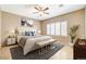 Staged bedroom features neutral decor and natural light at 7564 Wingspread St, North Las Vegas, NV 89084