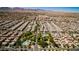 A neighborhood view of a well planned community featuring homes, parks, and pool at 7649 Calico Fields St, Las Vegas, NV 89149