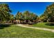 Lush green community space with walking path at 7649 Calico Fields St, Las Vegas, NV 89149