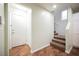 Entryway with staircase and tile floors leading to front door and closet at 7649 Calico Fields St, Las Vegas, NV 89149