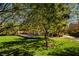Park with mature trees provide shade to the charming gazebo with picnic tables at 7649 Calico Fields St, Las Vegas, NV 89149