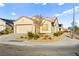 Inviting single story home showcasing a two-car garage and low-maintenance landscaping at 7904 Fantail Dr, North Las Vegas, NV 89084