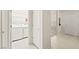 Bright laundry area with tile flooring and white washer and dryer at 7904 Fantail Dr, North Las Vegas, NV 89084