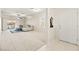 Open-concept living area with a large window and an adjacent dining area at 7904 Fantail Dr, North Las Vegas, NV 89084