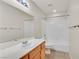 This bathroom has a tub, shower, and generous vanity space at 8472 W Gilmore Ave, Las Vegas, NV 89129
