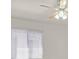 This bedroom has neutral carpeting and lots of natural light at 8472 W Gilmore Ave, Las Vegas, NV 89129