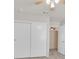 This bedroom has neutral carpeting and ample closet space at 8472 W Gilmore Ave, Las Vegas, NV 89129