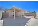 Enjoy this covered patio and desert landscaped backyard, great for relaxing and outdoor living at 8472 W Gilmore Ave, Las Vegas, NV 89129
