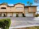 Attractive condo with well-maintained landscaping and garages at 8705 Red Brook Dr # 203, Las Vegas, NV 89128