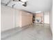 Well-organized garage with built-in cabinets and epoxy flooring at 8705 Red Brook Dr # 203, Las Vegas, NV 89128