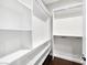 Spacious walk-in closet with custom shelving for optimal storage at 8705 Red Brook Dr # 203, Las Vegas, NV 89128