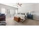 Spacious bedroom with neutral decor, ceiling fan, and natural light at 9120 Mastodon Ave, Las Vegas, NV 89149