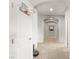 Hallway with carpet floors, and an arched ceiling at 9120 Mastodon Ave, Las Vegas, NV 89149