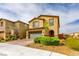 Charming two-story home with a two car garage, brick driveway and manicured landscaping, perfect for Gathering living at 9160 Lynea Ct, Las Vegas, NV 89178