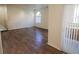 Open living space with hardwood floors and access to private patio at 9325 W Desert Inn Rd # 110, Las Vegas, NV 89117