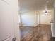 Spacious living room features wood-look floors and lots of natural light at 9325 W Desert Inn Rd # 110, Las Vegas, NV 89117