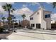 Rear exterior with a view of the home with patio dining next to a swimming pool at 9520 Wooden Pier Way, Las Vegas, NV 89117