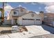 Inviting home with a three-car garage and well-manicured landscaping at 9520 Wooden Pier Way, Las Vegas, NV 89117