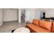 Bright and spacious living room flows to a staircase and dining area at 9520 Wooden Pier Way, Las Vegas, NV 89117