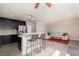 The open concept kitchen and living room provides space to entertain at 9520 Wooden Pier Way, Las Vegas, NV 89117