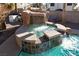 Poolside spa and rock waterfall feature in a tranquil backyard oasis at 9520 Wooden Pier Way, Las Vegas, NV 89117