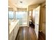 Bathroom featuring hardwood floors, double sink vanity, and glass shower doors at 9792 Cordova Vista Ct, Las Vegas, NV 89183